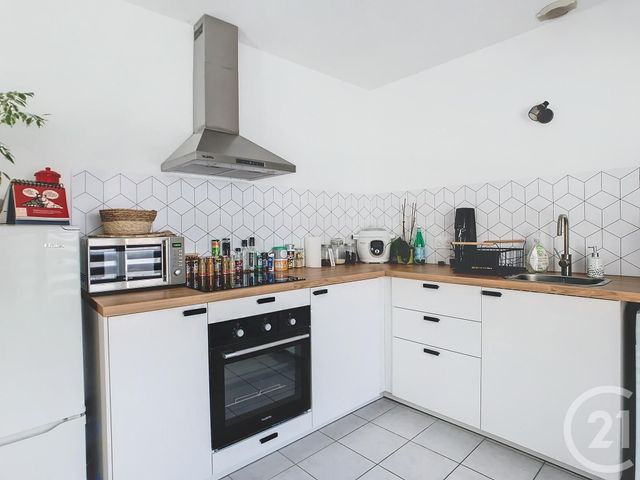 Appartement F3 à louer - 3 pièces - 52.97 m2 - NORT SUR ERDRE - 44 - PAYS-DE-LOIRE - Century 21 C.A.I.